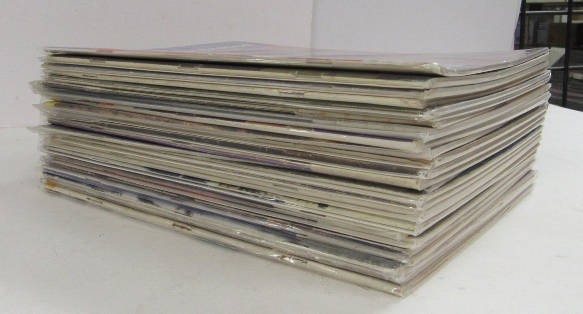 Lot of (25) 1963 Sports Illustrated Magazines Staubach 1st Cover 197970